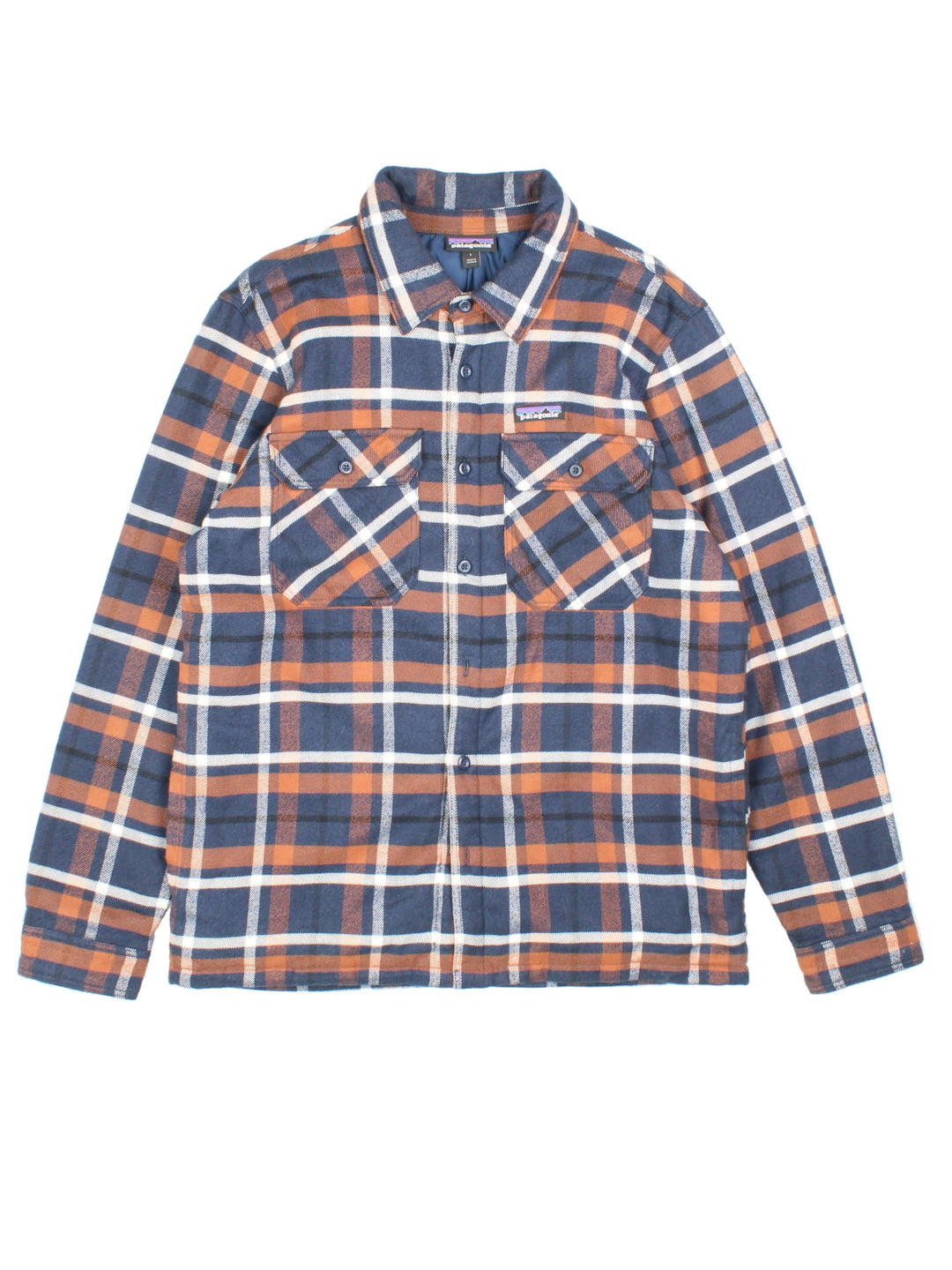 Patagonia Flannel Jacket in a blue, brown and white colourway, button up with double chest pockets, insulated with a quilted lining, and has the logo embroidered on the front.