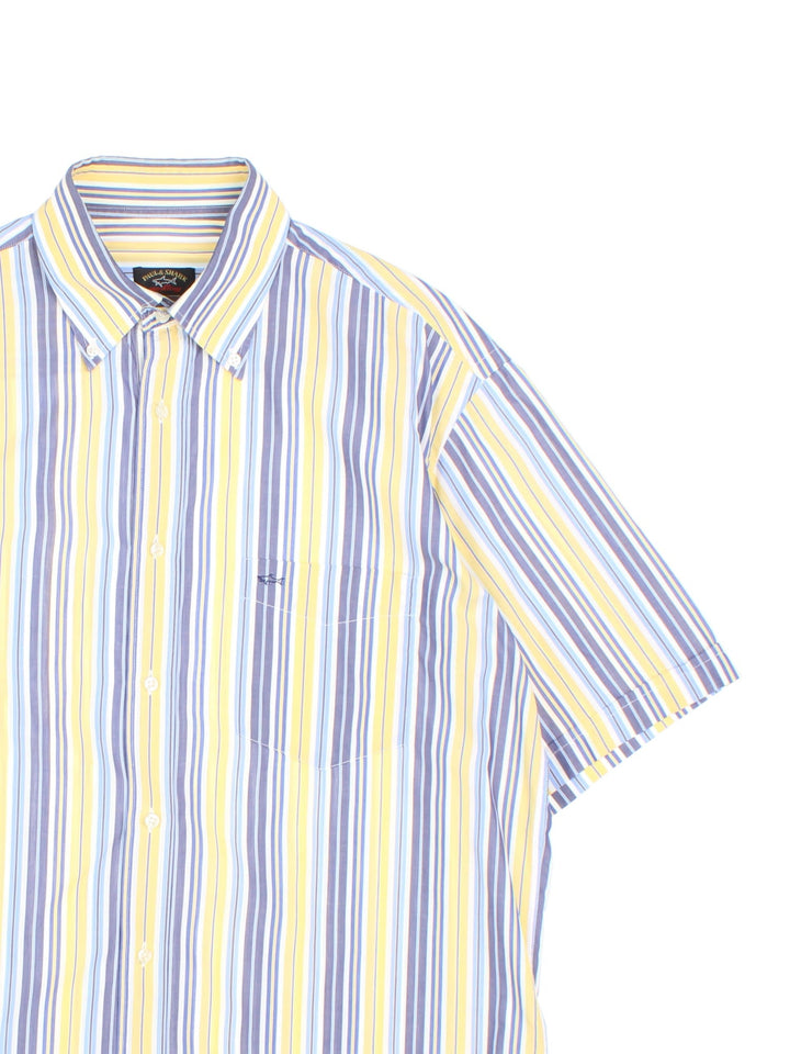 Paul & Shark Short Sleev Shirt in a yellow, blue and whitem striped colourway, button up and has a chest pocket with the logo embroidered on the front.