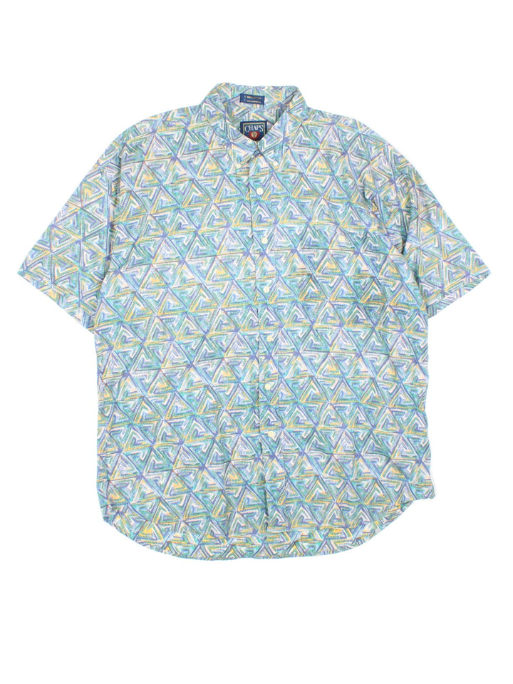 Chaps Ralph Lauren Shirt in a blue patterned colourway, button up and has a chest pocket, triangle patterns printed all over .