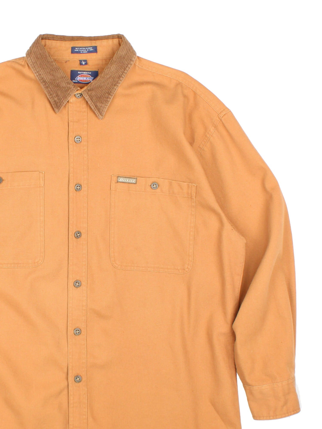 Dickies Work Overshirt in a brown colourway with a corduroy collat, button up and has double chest pockets with the logo embroidered on the front.