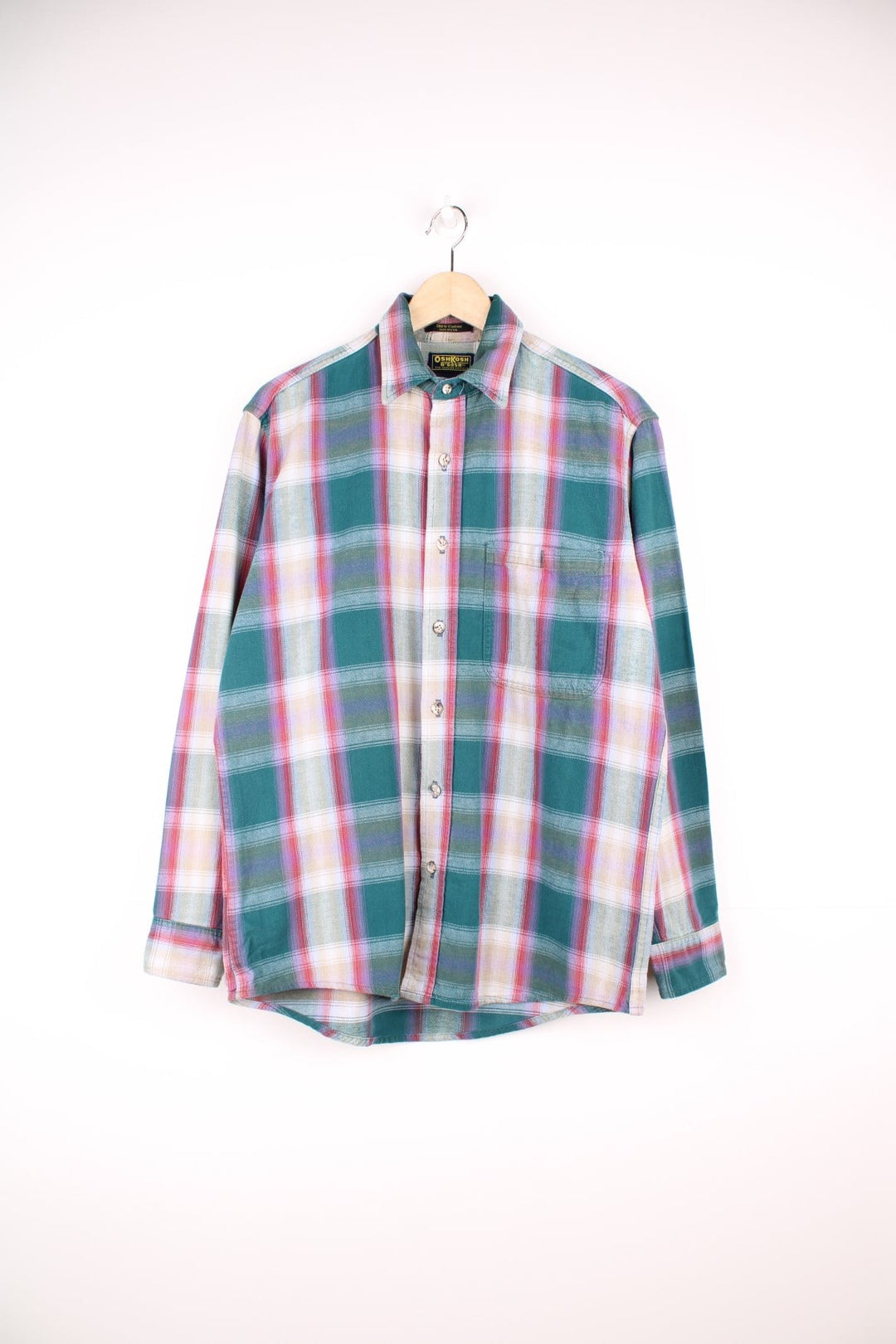 Vintage Oshkosh B'gosh plaid shirt in green, red, beige and purple. Features pocket on the chest. 