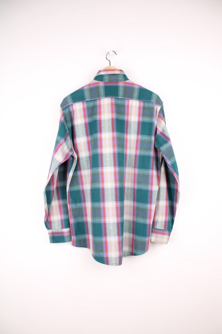 Vintage Oshkosh B'gosh plaid shirt in green, red, beige and purple. Features pocket on the chest. 