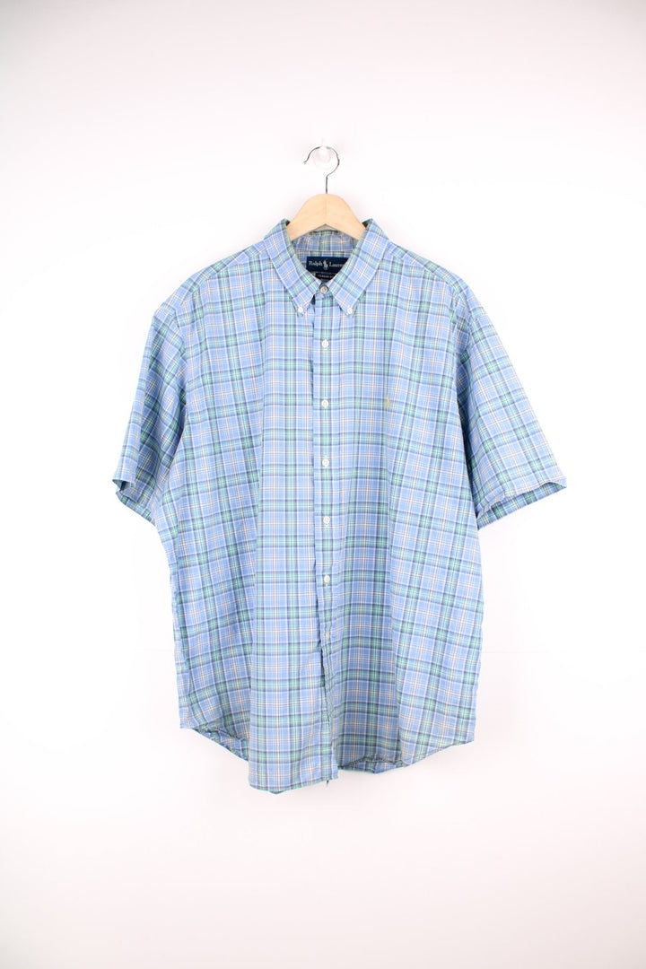 Ralph Lauren blue, green and yellow plaid shirt. Features signature embroidered logo on the chest.