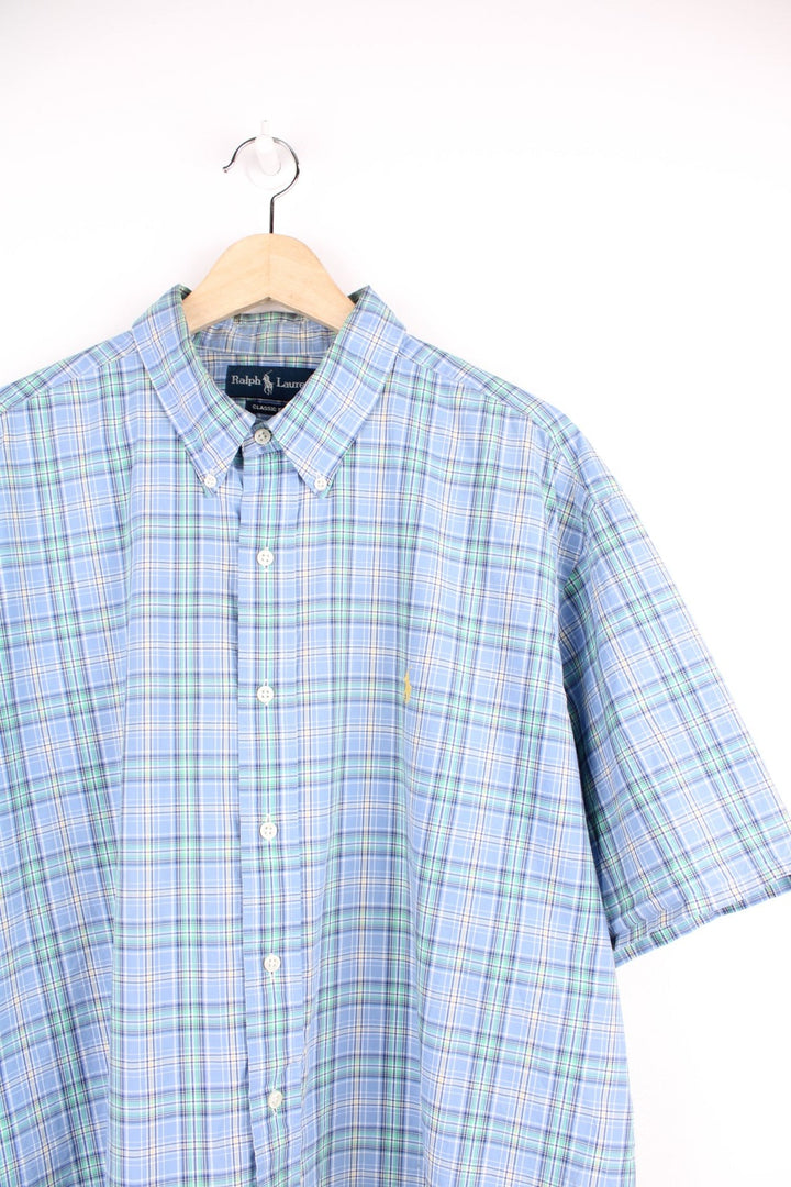 Ralph Lauren blue, green and yellow plaid shirt. Features signature embroidered logo on the chest.