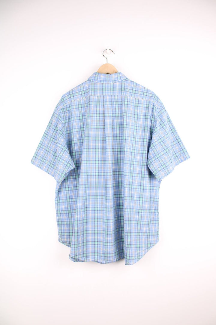 Ralph Lauren blue, green and yellow plaid shirt. Features signature embroidered logo on the chest.