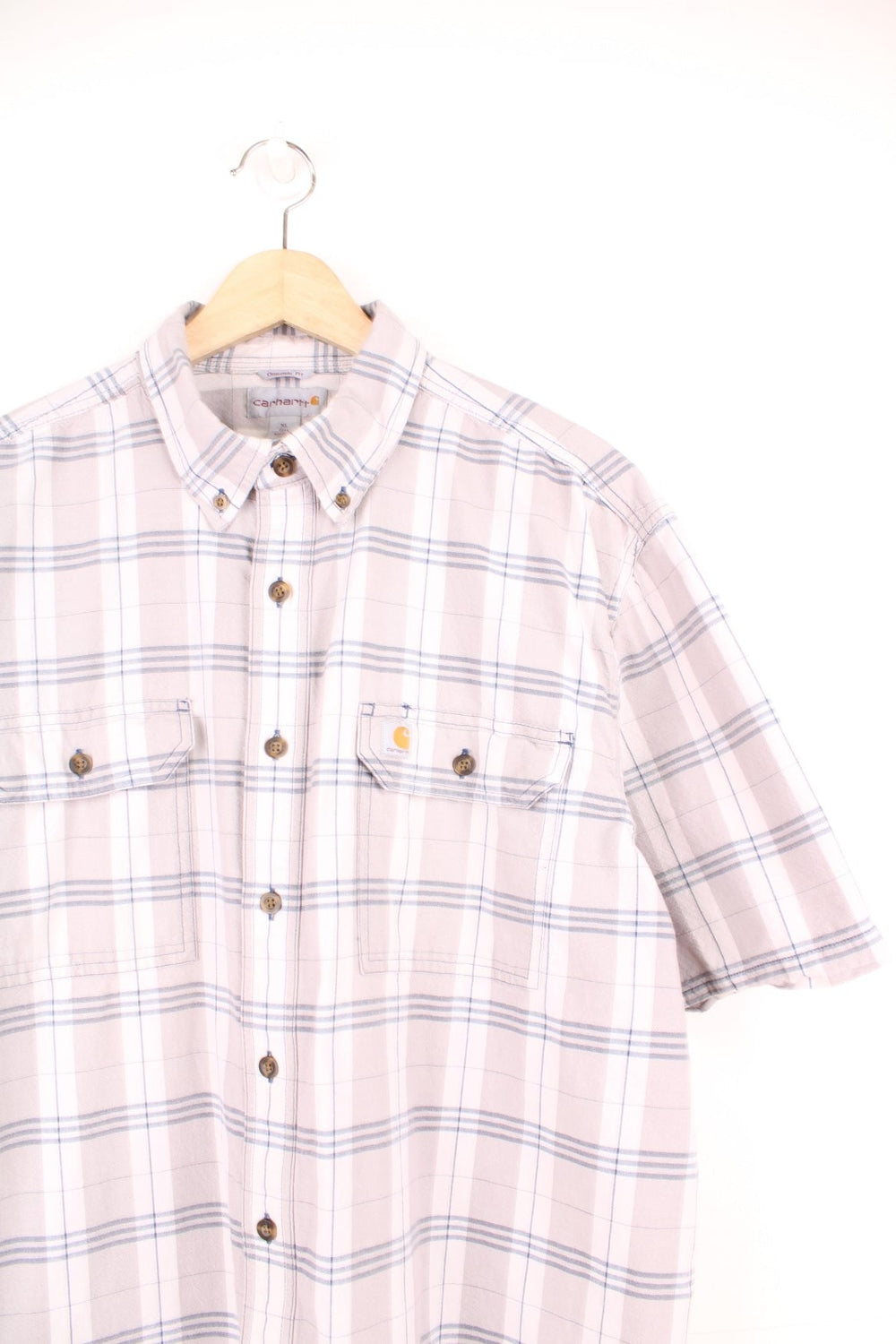 Carhartt grey and blue check short-sleeved button-down shirt with double flap pockets and brown buttons.  