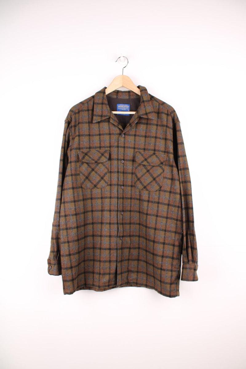 Vintage Pendleton green and black plaid button through shirt with chest pockets. 