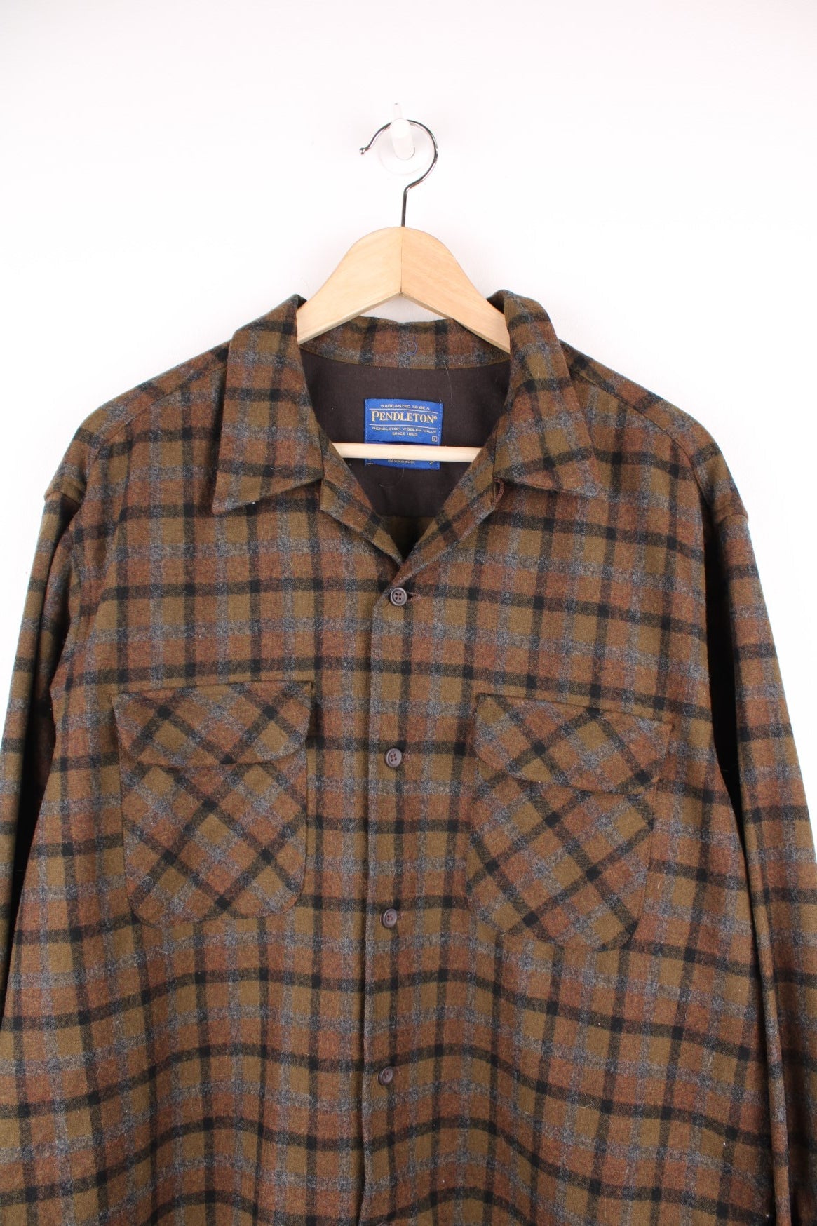 Vintage Pendleton green and black plaid button through shirt with chest pockets. 