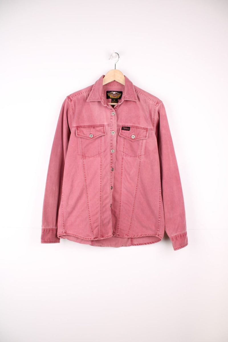 Vintage Harley Davidson pink denim button through shirt. Features chest pockets and embroidered spell out logo.