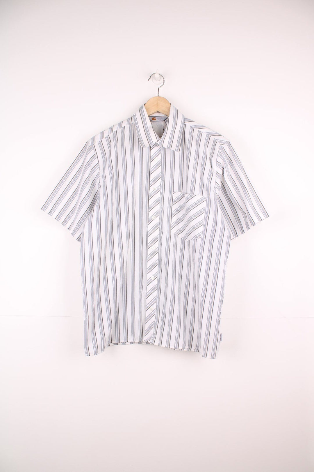 Vintage Carhartt striped shirt in white with blue, yellow and black stripes and chest pocket.