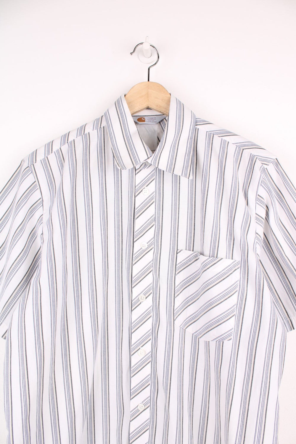 Vintage Carhartt striped shirt in white with blue, yellow and black stripes and chest pocket.