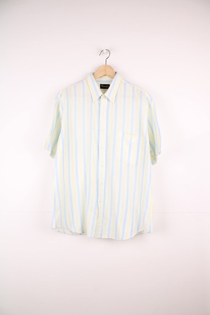 Vintage Wrangler short sleeved striped shirt in white, blue and yellow with chest pocket and embroidered logo.