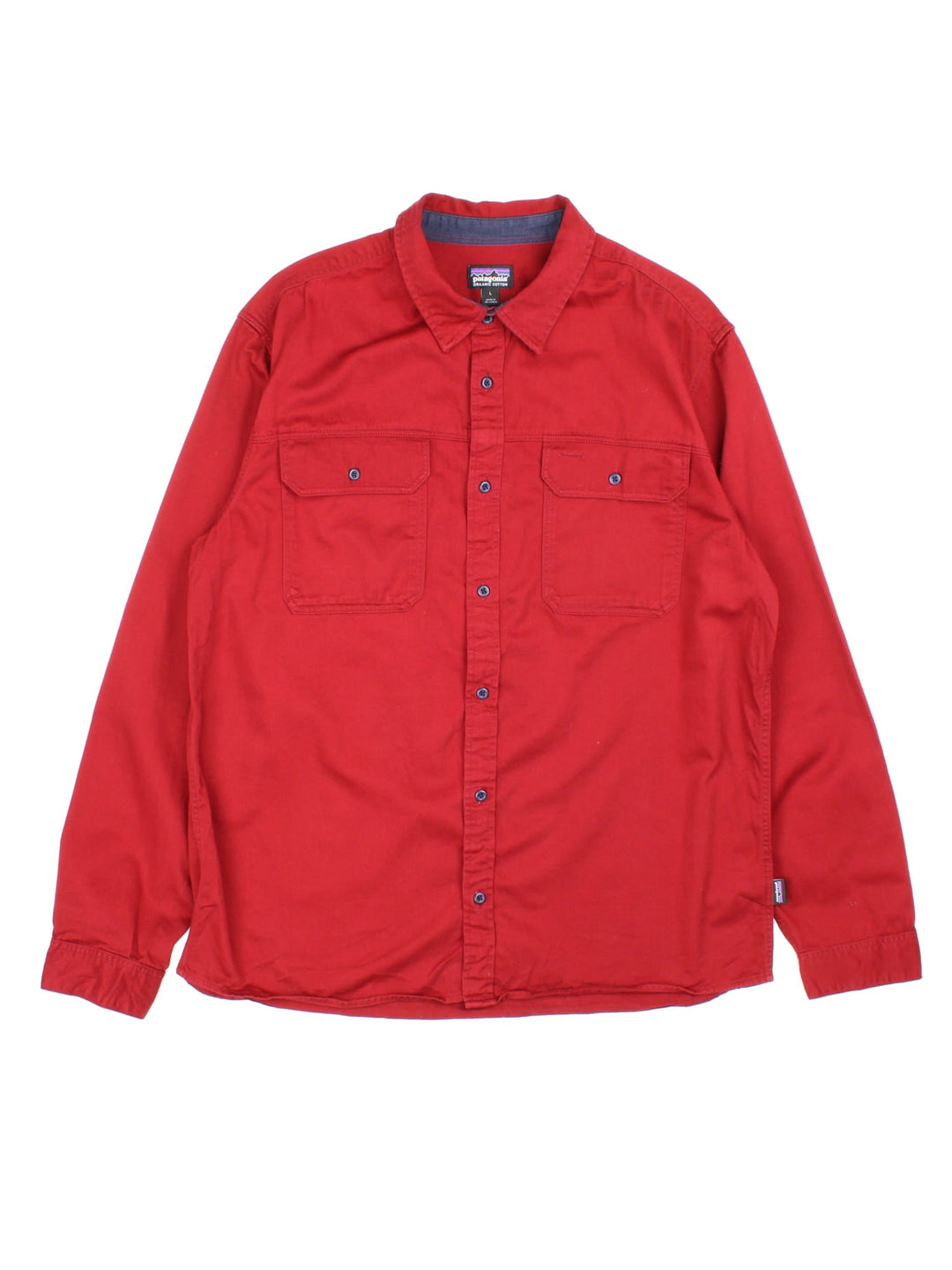 Patagonia overshirt in red with button closure and two chest pockets.