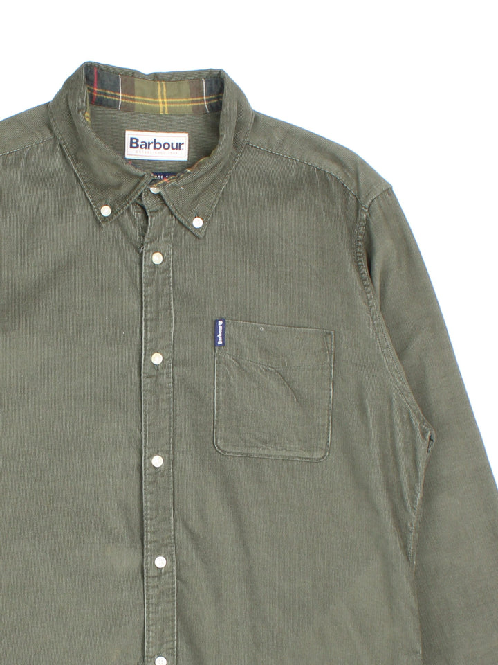 Barbour corduroy button-down shirt in a sage green colourway with one pocket and a small logo tab.