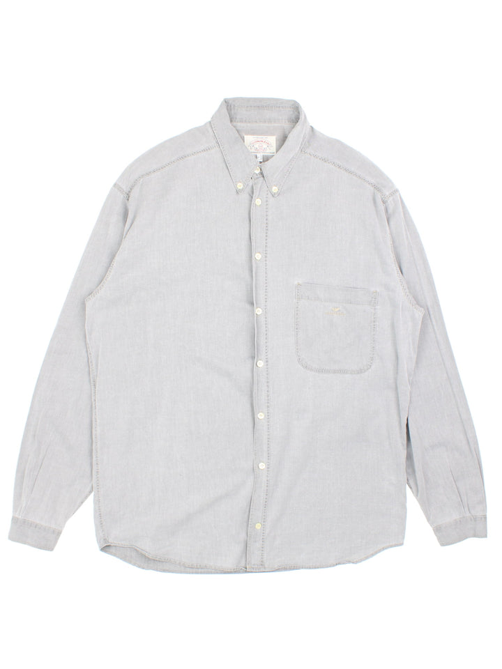 Armani Jeans button-down shirt in grey with one pocket and a small embroidered logo on the front.