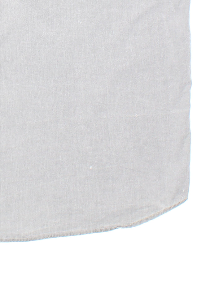 Armani Jeans button-down shirt in grey with one pocket and a small embroidered logo on the front.