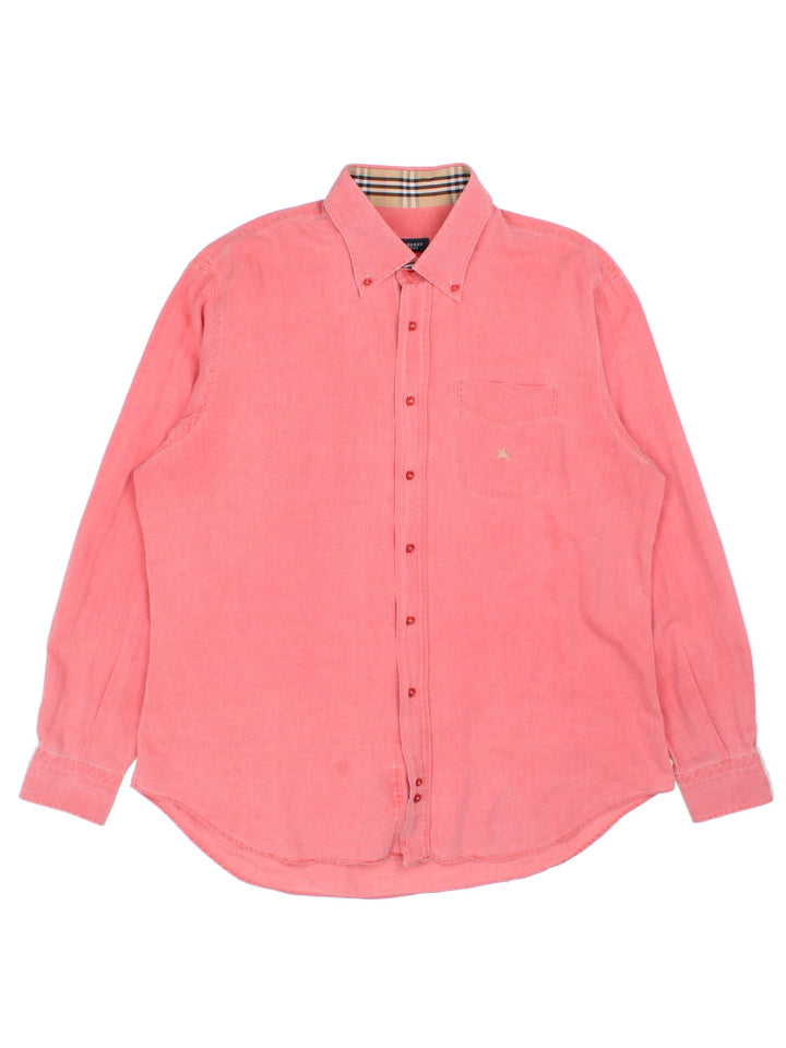 Burberry Shirt in a red colourway, button up with the logo embroidered on the front.