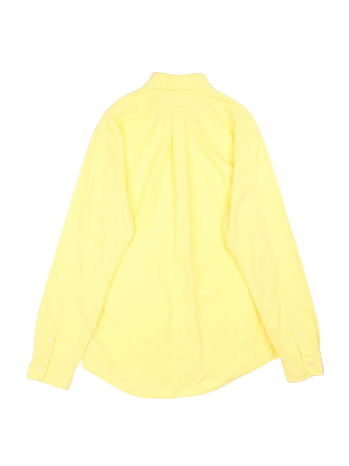 Ralph Lauren Shirt in a yellow colourway, button up with a blue logo embroidered on the front.