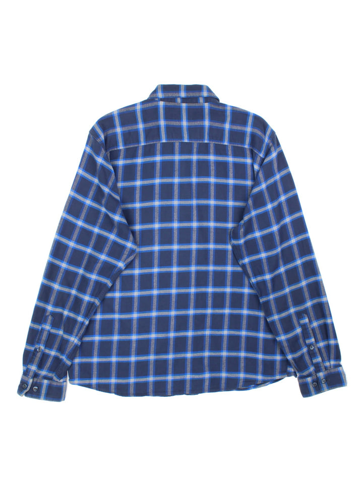 Patagonia Shirt in a blue checked colourway, button up with the logo embroidered on the front.