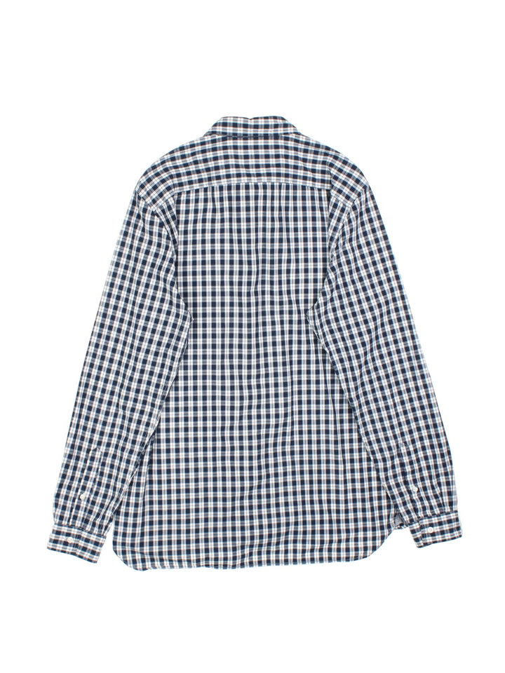 Lacoste Shirt in a blue checked colourway, button up with the logo embroidered on the front.