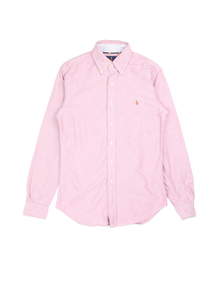 Ralph Lauren Shirt in a pink colourway, button up with the logo embroidered on the front.