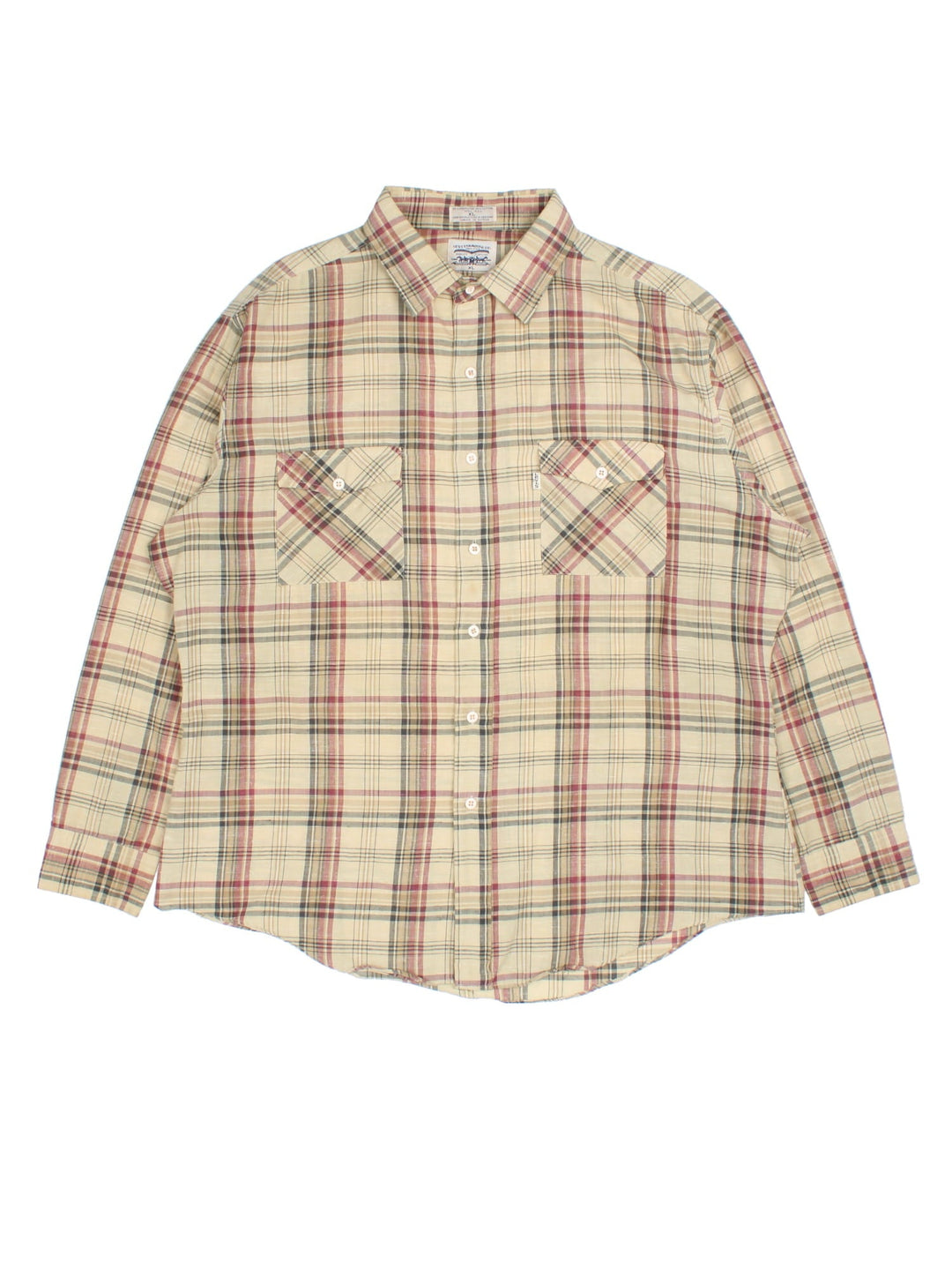 Carhartt Shirt in a brown multi checked colourway, button up with the leather logo patch on front pocket.