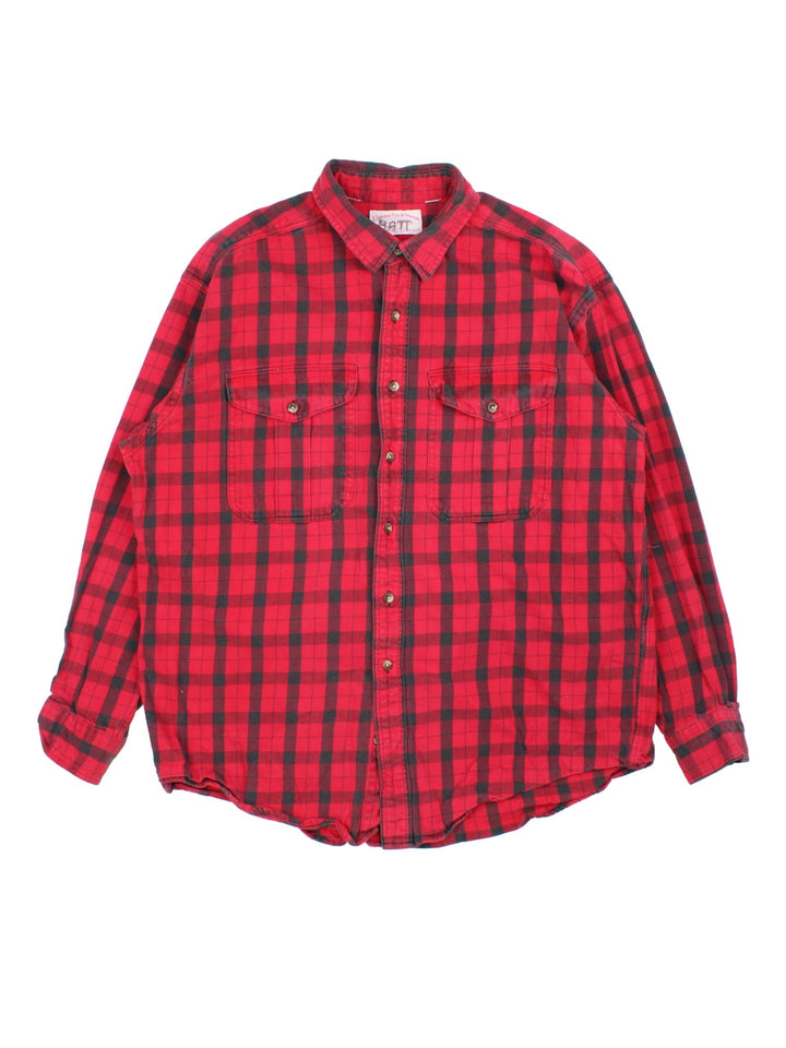 Vintage Flannel Shirt in a red colourway with checked pattern. Classic button up and front pocket..