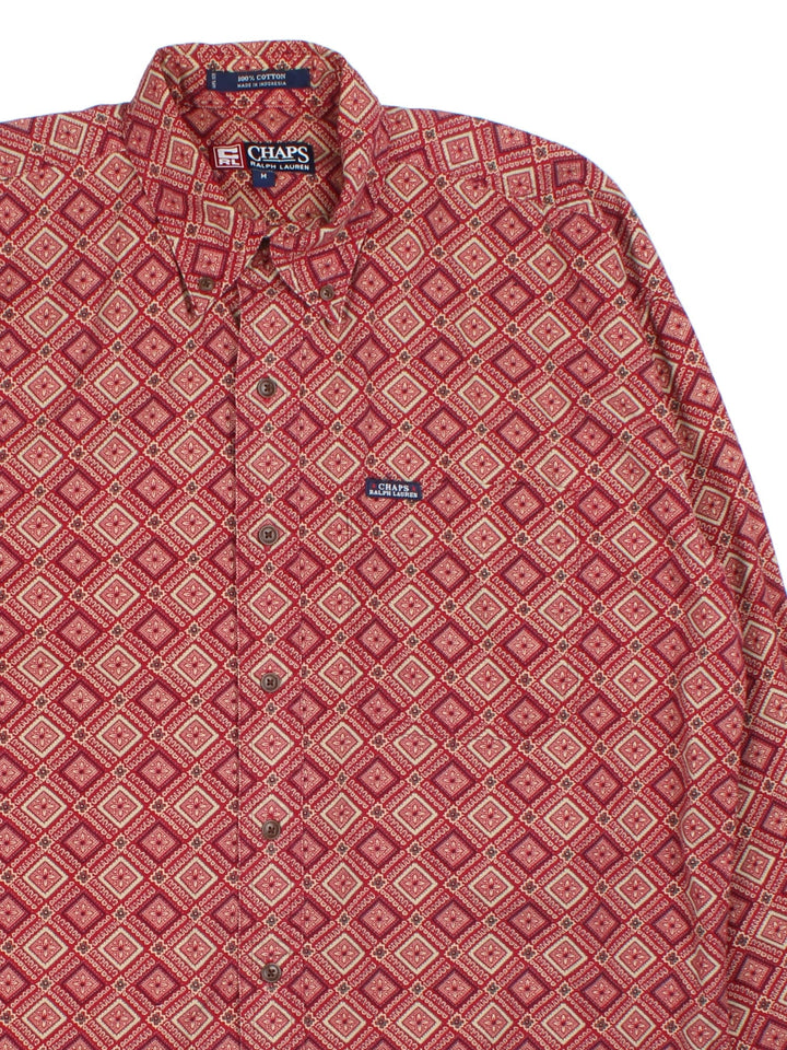 Ralph Lauren Shirt in a red colourway with floral pattern. Classic button up with front pocket.