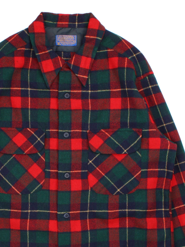 Pendleton Flannel Shirt in a red colourway with checked pattern. Classic button up with double front pocket.