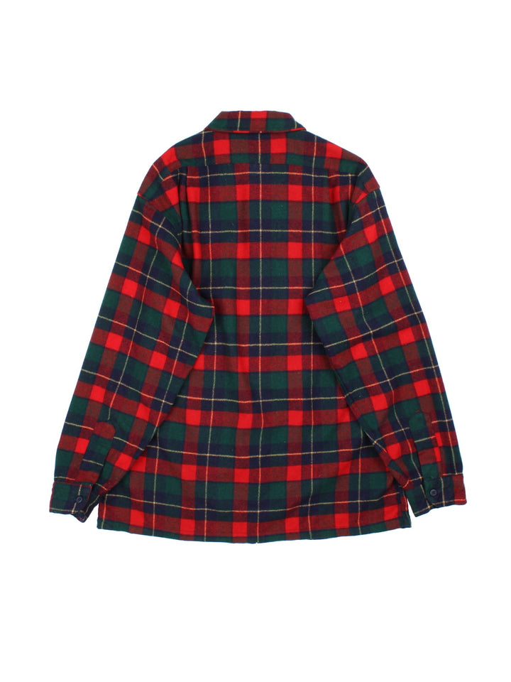 Pendleton Flannel Shirt in a red colourway with checked pattern. Classic button up with double front pocket.