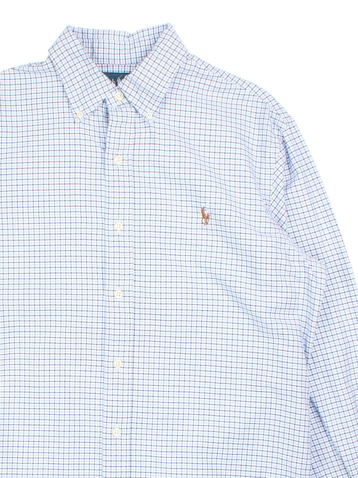 Ralph Lauren Shirt in a blue colourway with checked pattern. Classic button up and small logo on the front.