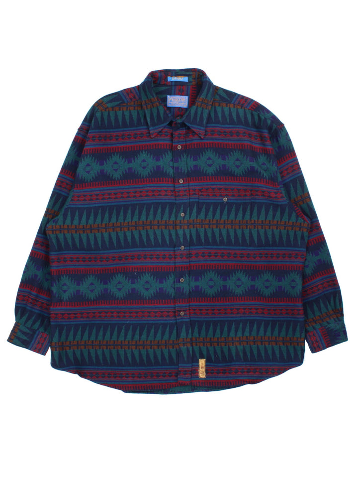 Pendleton Shirt in a blue colourway with aztec style pattern. Classic button up with front pocket.