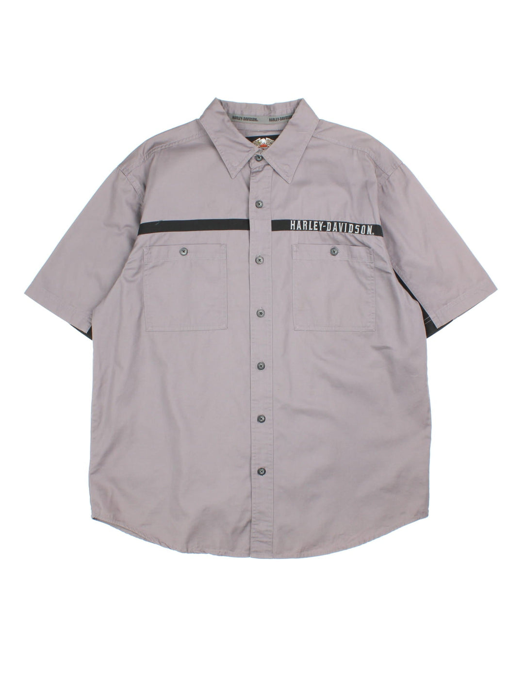 Harley-Davidson Shirt in a grey colourway with black panel detailing across the front,sleeves and back. Classic button up with two front pockets, Large brand name and flame graphic on the back.