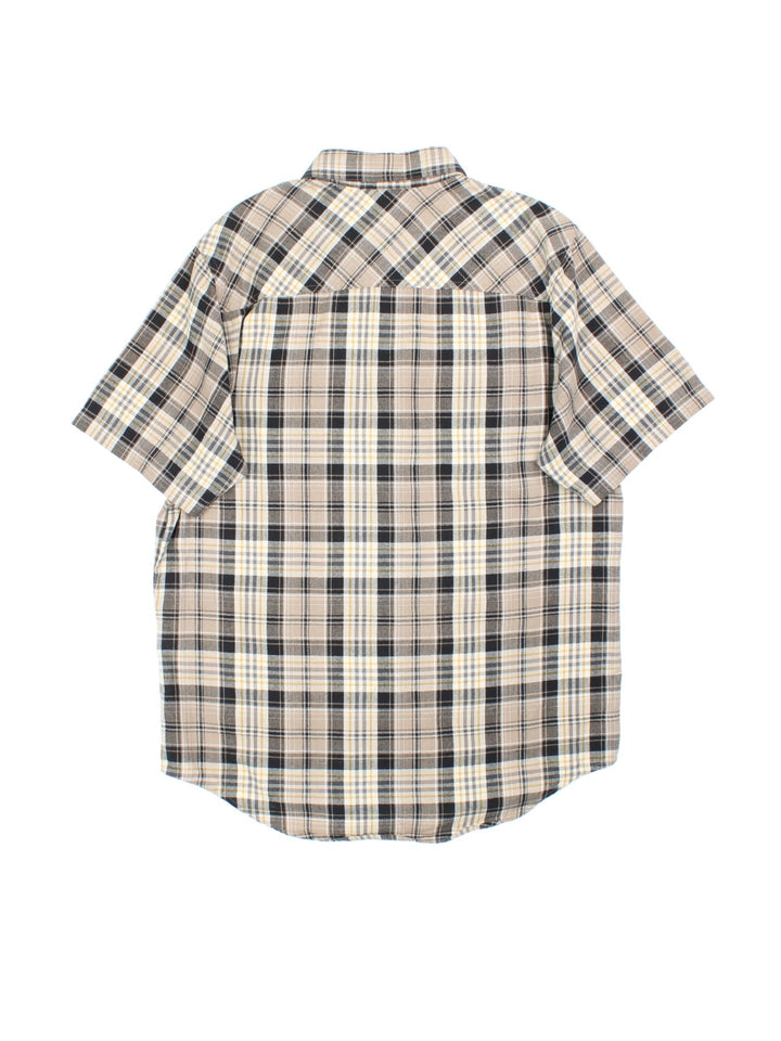 Harley-Davidson Short Sleeve Shirt in a tan colourway with checked pattern.Button up with two pockets on the front and small metal logo just above the pocket.  .