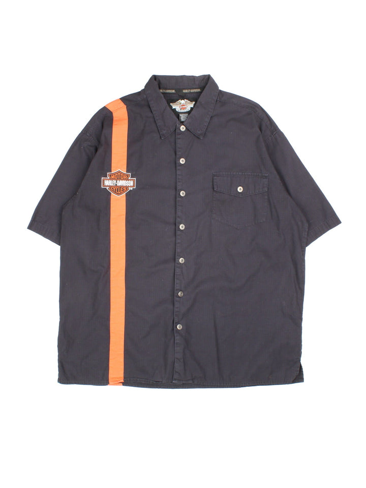 Harley-Davidson Shirt in a black colourway, with contrast orange stripe. Button up with front pocket and embroidered logo.