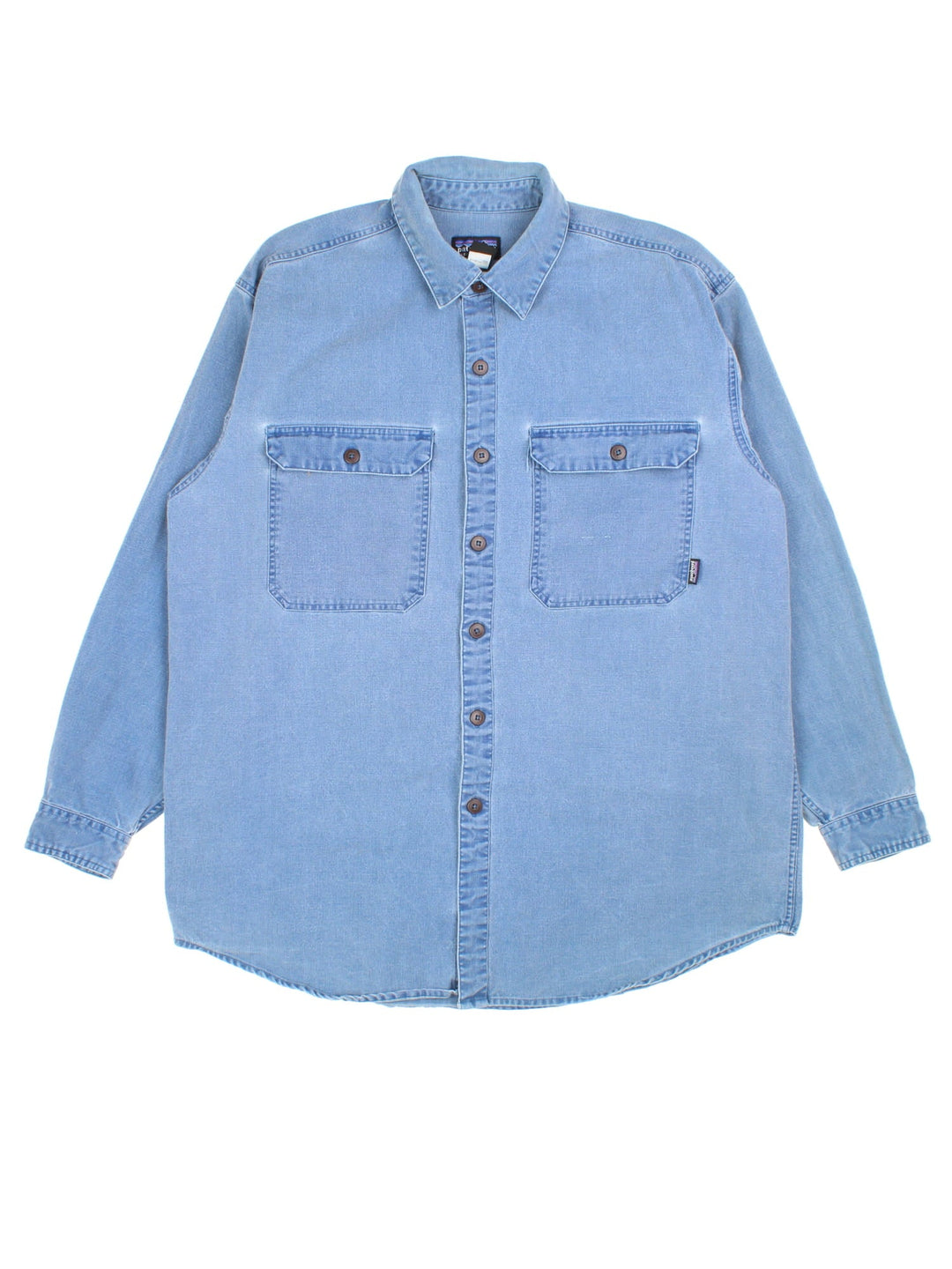 Patagonia Denim Shirt in a blue colourway, button up with two front pockets.