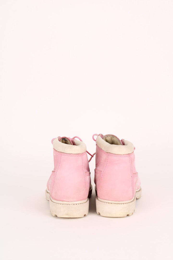 Vintage Timberland Nellie Boots in a pink colourway with the logo embroidered on the side, and has adjustable laces.