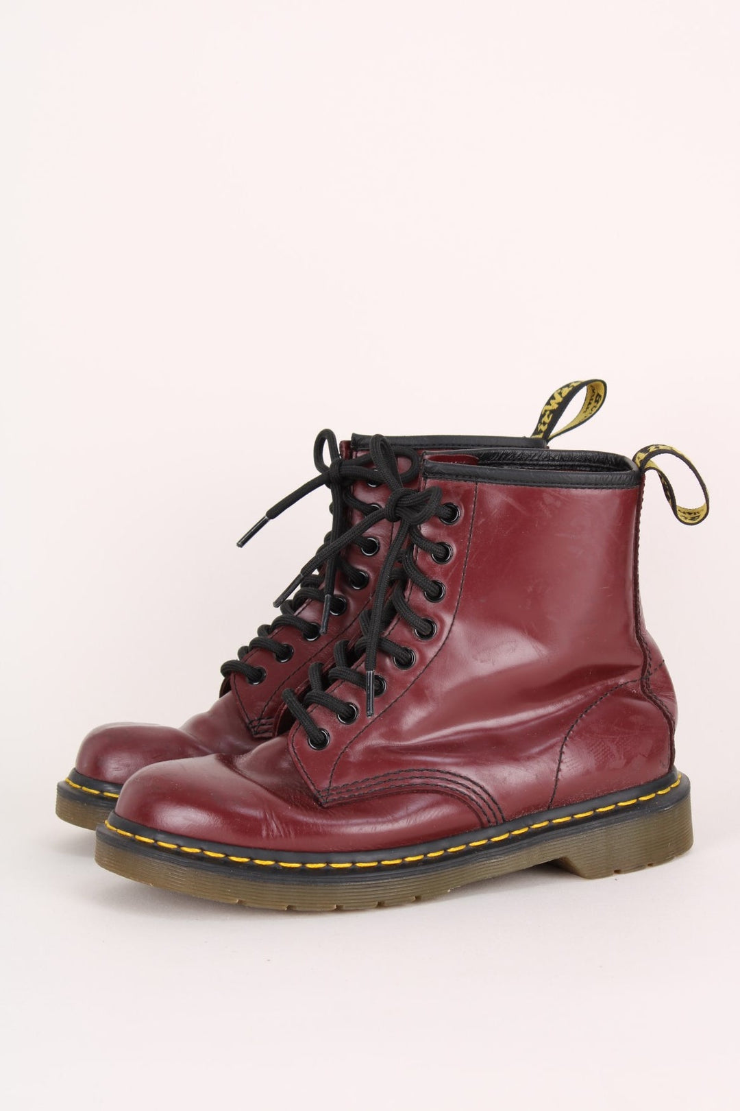 Dr Martens 1460 Boots in the cherry red colourway, high rise boots, and have adjustable laces.