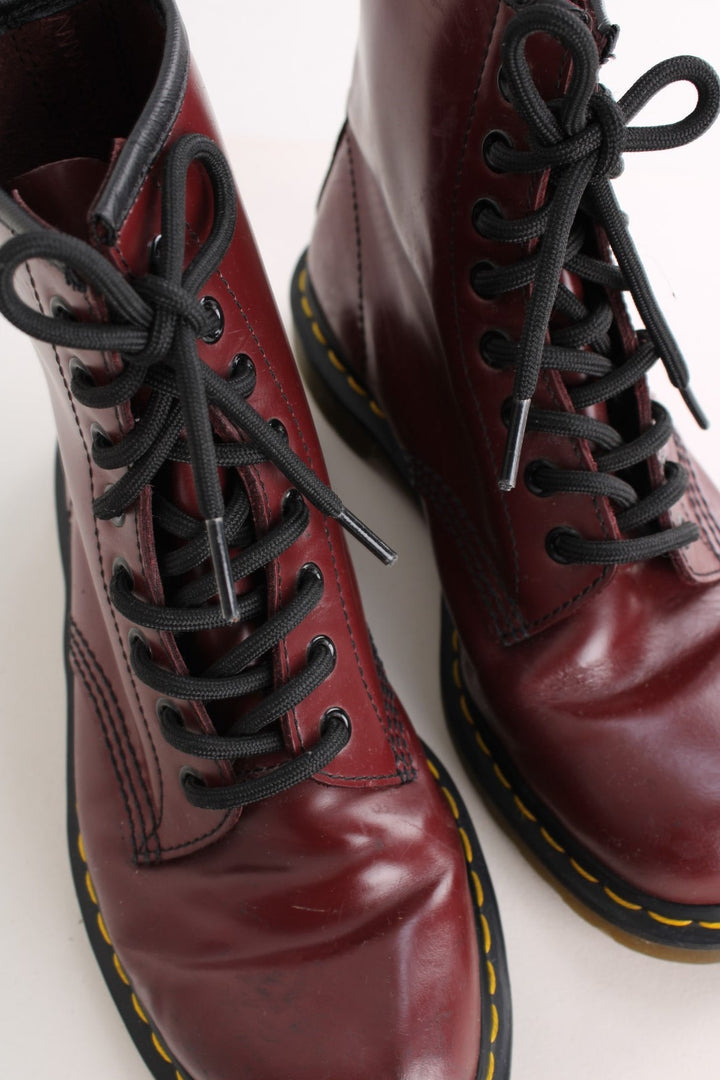 Dr Martens 1460 Boots in the cherry red colourway, high rise boots, and have adjustable laces.