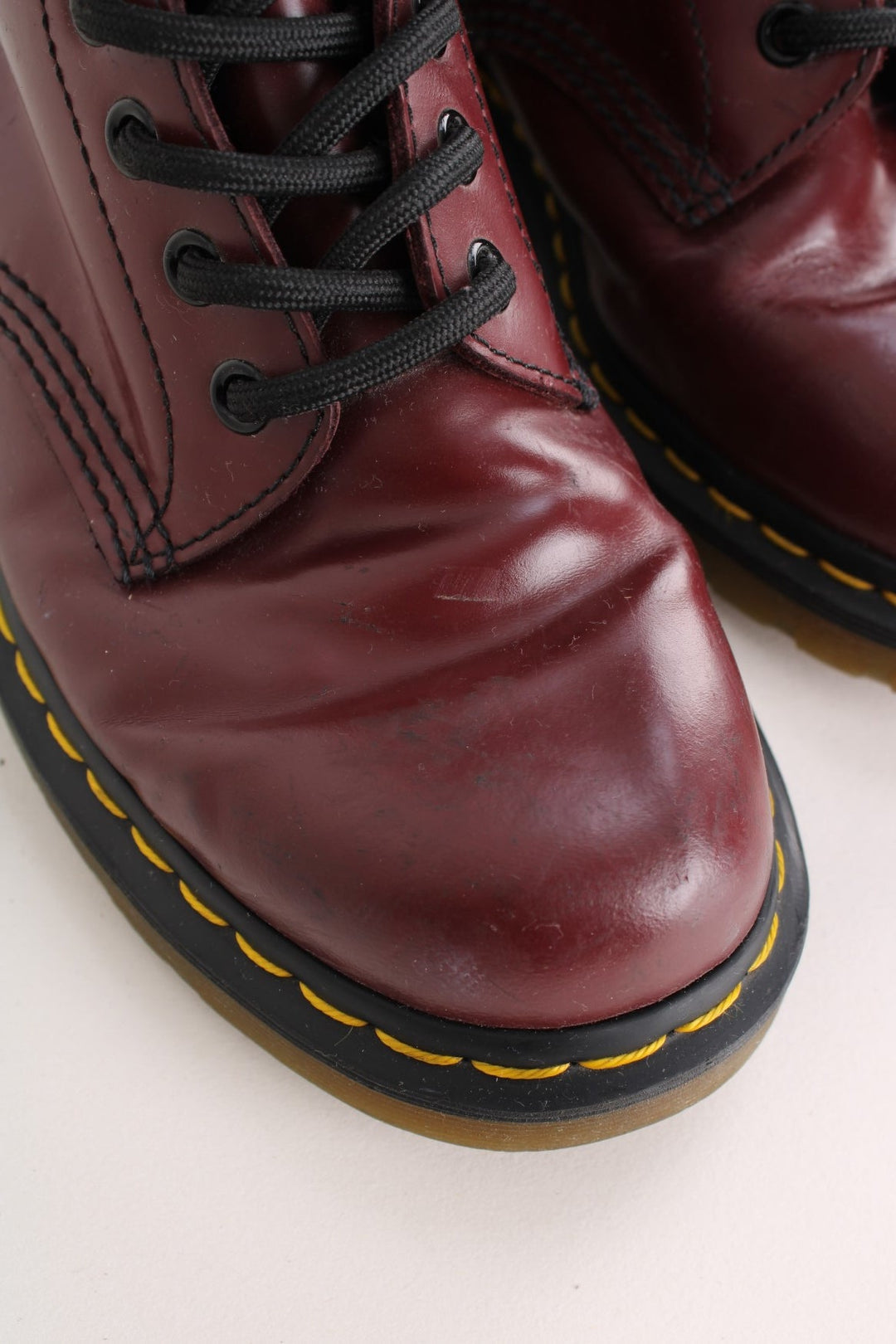 Dr Martens 1460 Boots in the cherry red colourway, high rise boots, and have adjustable laces.