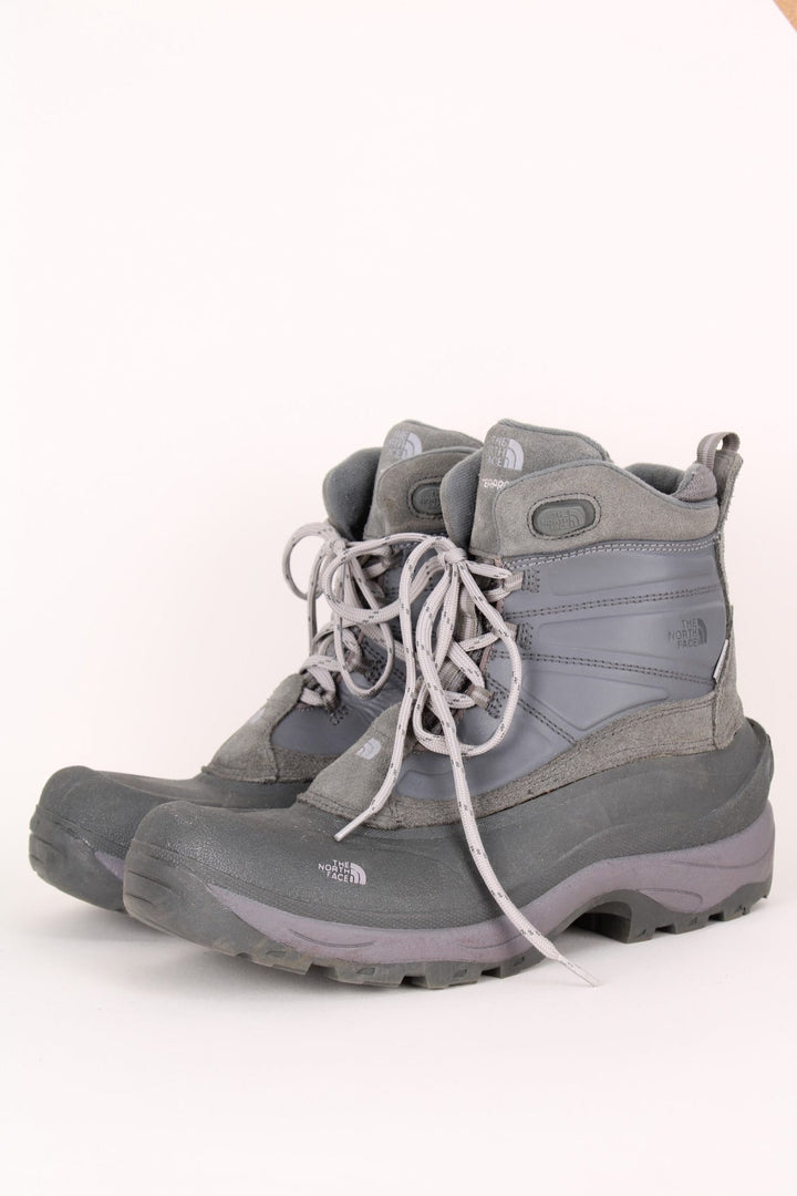 The North Face Snow Boots in a grey colourway with the logo embroidered on the front and sides, high rise insulated boots with adjustable laces.