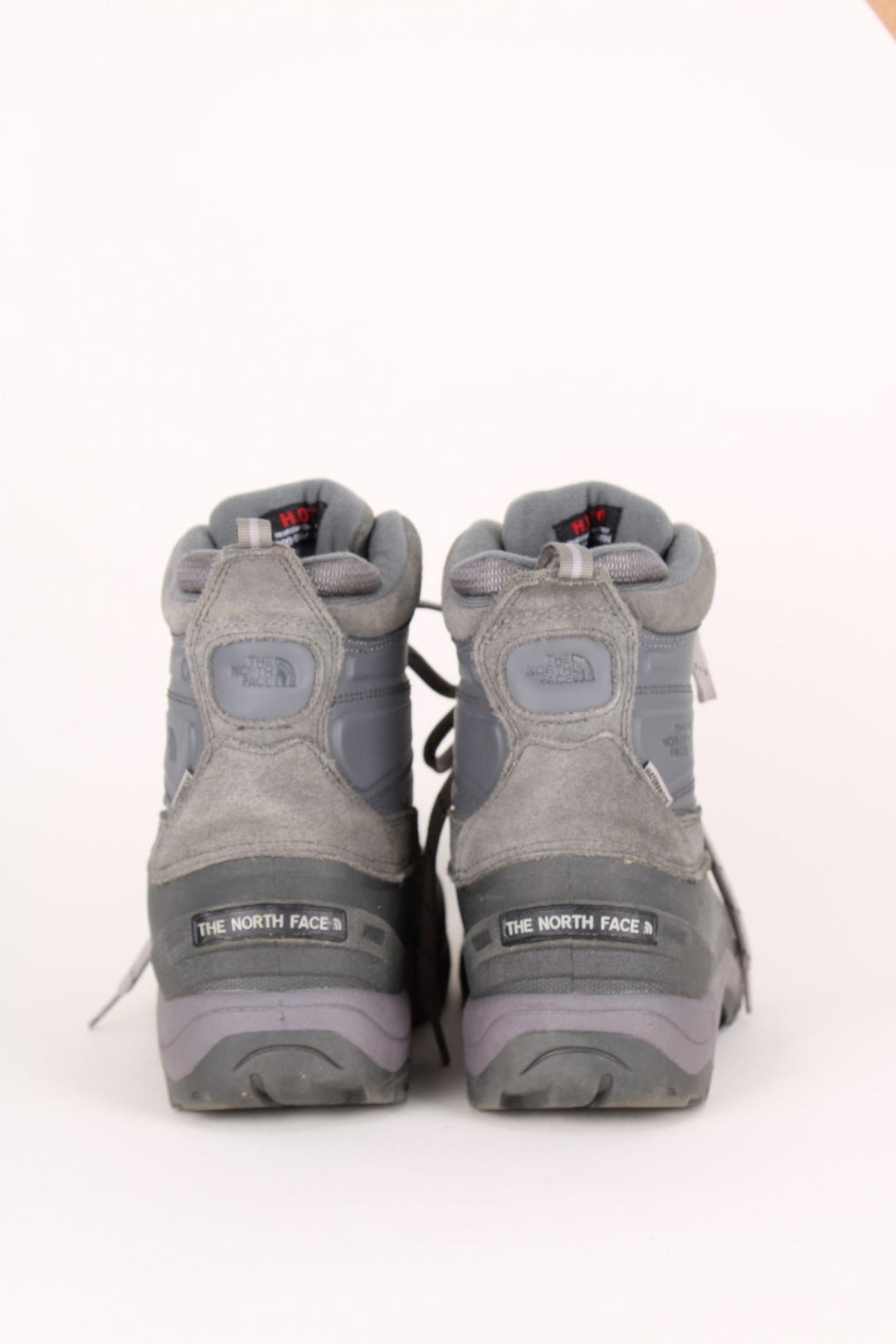 The North Face Snow Boots in a grey colourway with the logo embroidered on the front and sides, high rise insulated boots with adjustable laces.