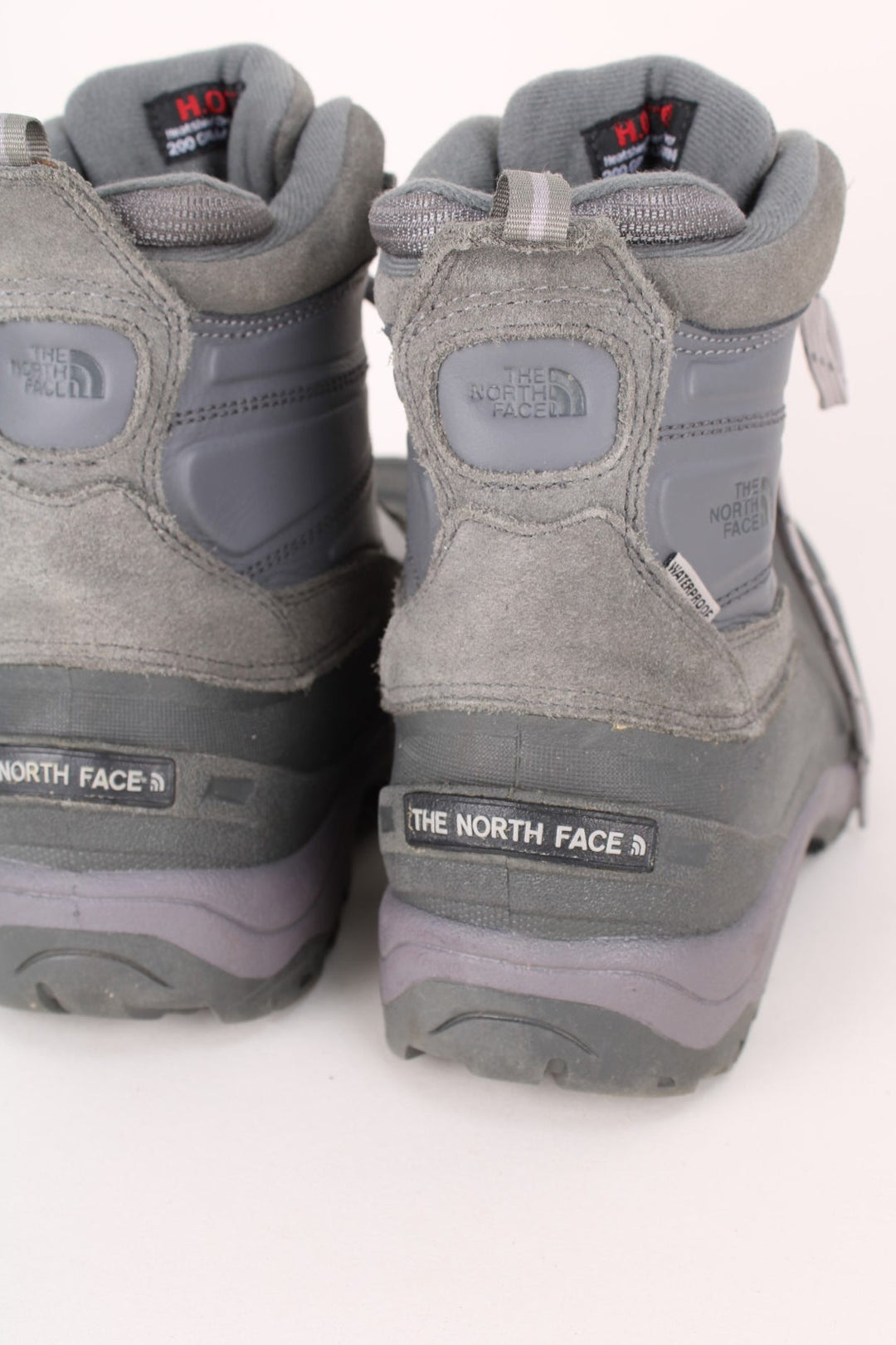 The North Face Snow Boots in a grey colourway with the logo embroidered on the front and sides, high rise insulated boots with adjustable laces.