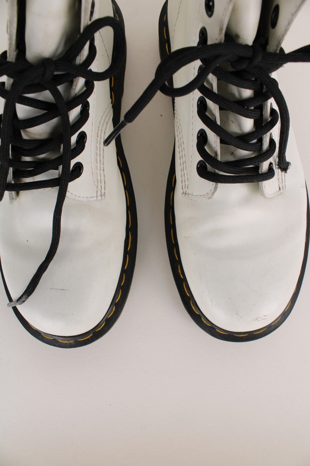 Dr Martens 1460 Boots in a white colourway, high rise boots with adjustable laces.