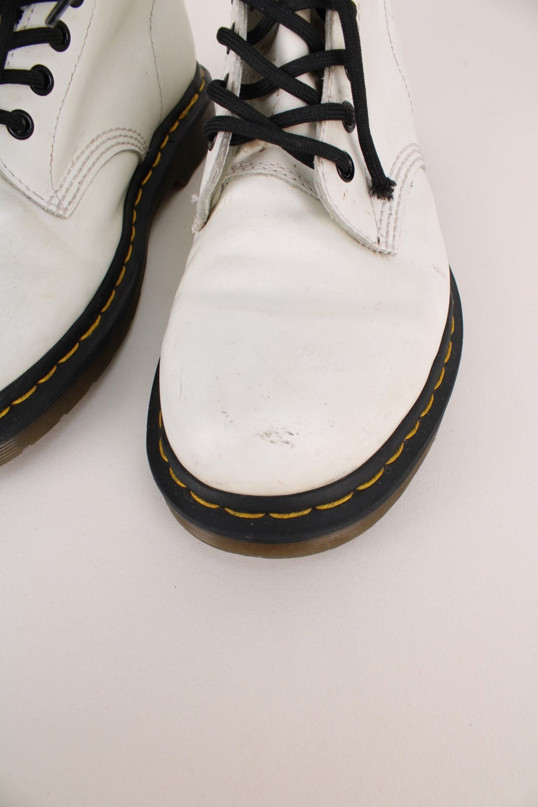 Dr Martens 1460 Boots in a white colourway, high rise boots with adjustable laces.