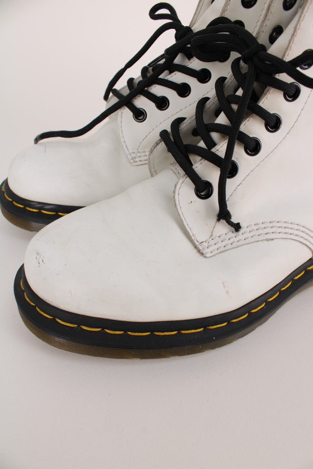 Dr Martens 1460 Boots in a white colourway, high rise boots with adjustable laces.