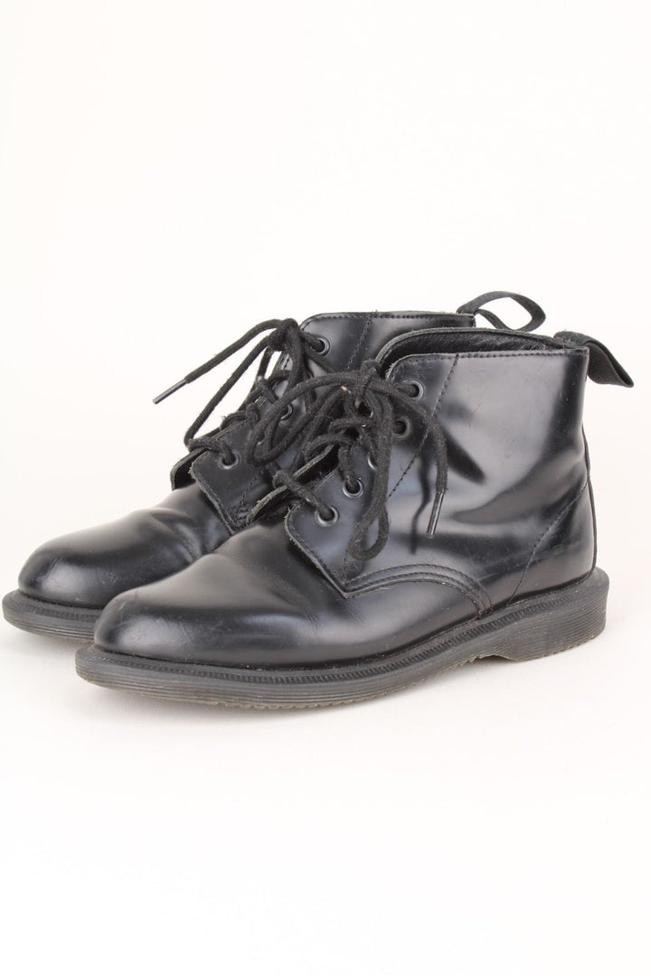 Vintage Dr Martens Emmeline Boots in a black colourway, mid rise boots, and has adjustable laces.