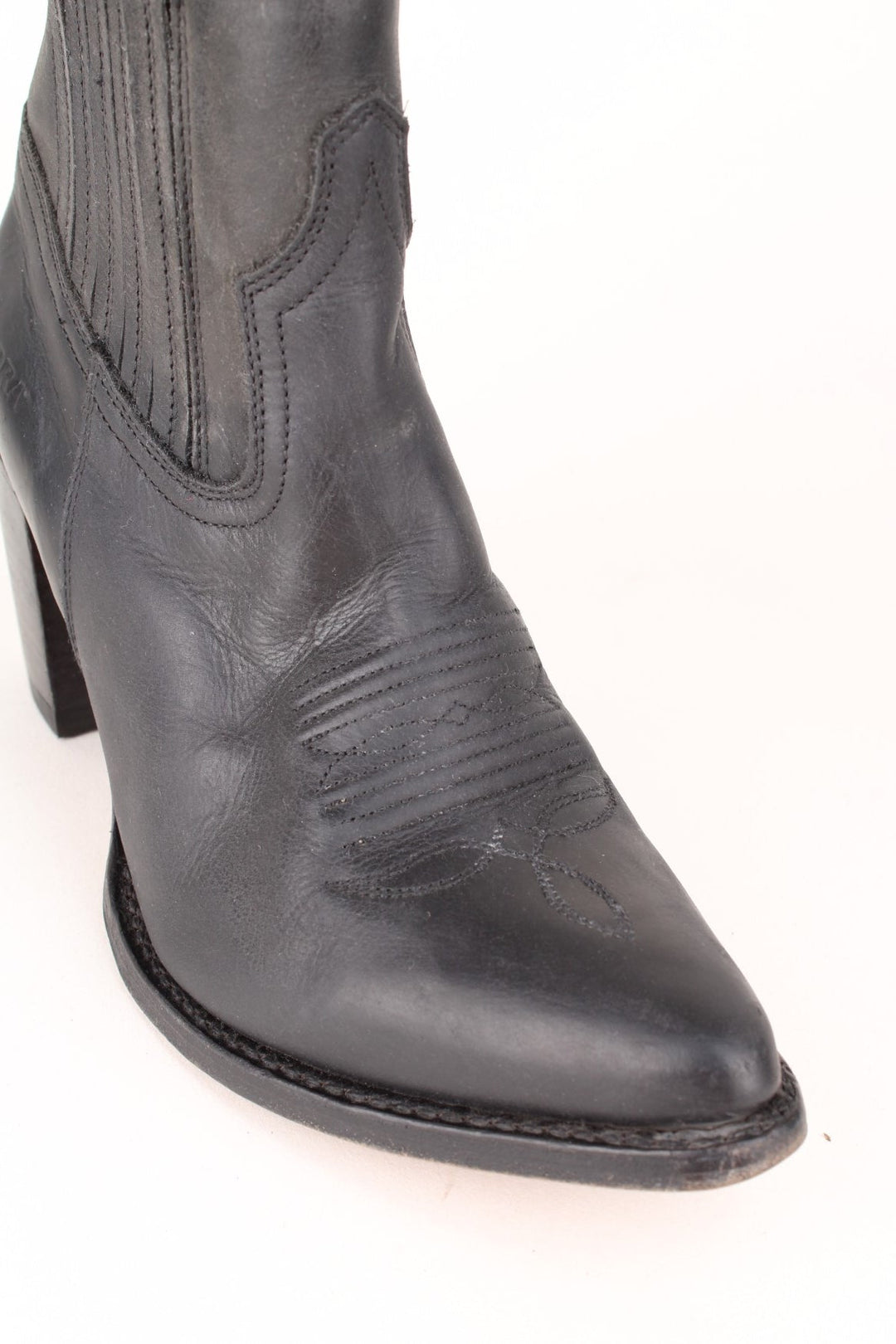 Vintage Sendra Western Boots in a black colourway with embroidered patterns on the front and going up the sides.