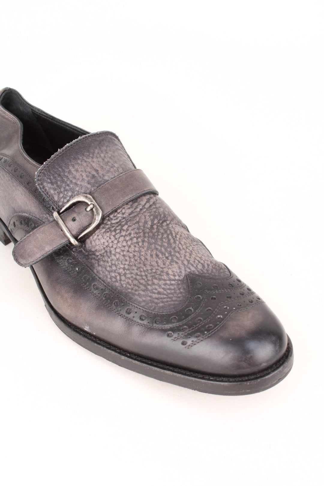 Vintage Dolce & Gabbana Loafers in a black colourway with the western style patterns throughout, and has strap feature on the front.