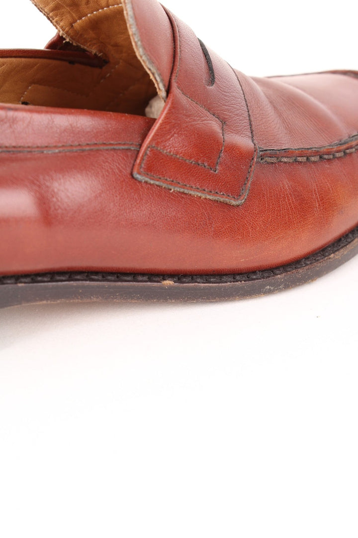 Vintage Burberry Loafers in a brown colourway and has a strap feature on the front.